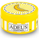 Adeus Banana Cream for lightening dark spots on face and body, 100g, featuring the ADEUS brand in a squeeze tube.