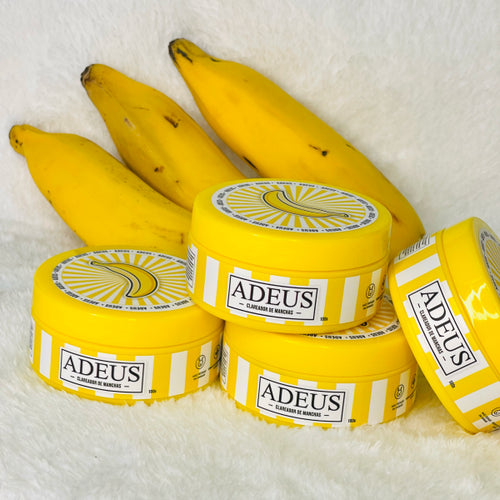 Adeus Banana Cream for lightening dark spots on face and body, 100g, with a creamy texture and natural banana extract.