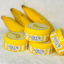 Adeus Banana Cream for lightening dark spots on face and body, 100g, with a creamy texture and natural banana extract.