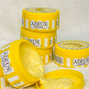 Adeus Banana Cream in a 100g jar, designed to lighten dark spots on face and body with natural banana extract.