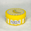 Adeus Banana Cream jar for lightening dark spots on face and body, 100g, with a clear container showing the creamy product inside.