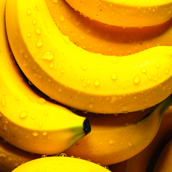 ADEUS Banana Glow Duo with dark spot corrector cream and radiance renewal scrub, featuring brightening banana-infused skincare products.