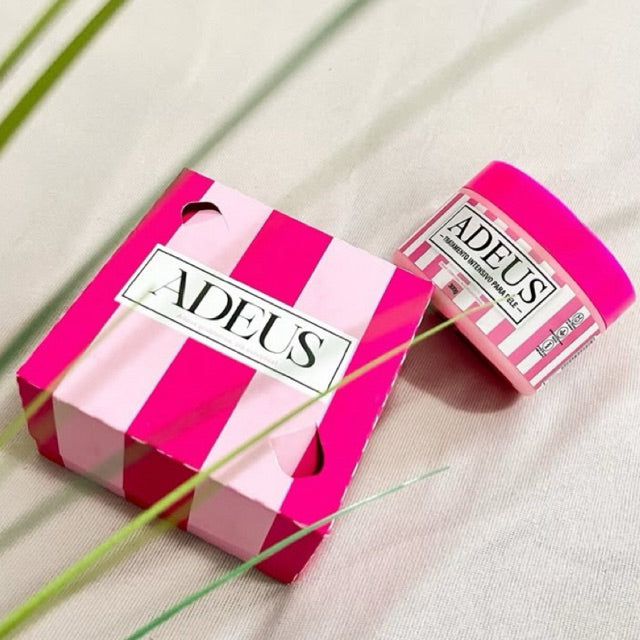 Adeus Intensive Skin Treatment body cream in 300g jar, featuring a rich, nourishing formula for smooth, healthy skin.