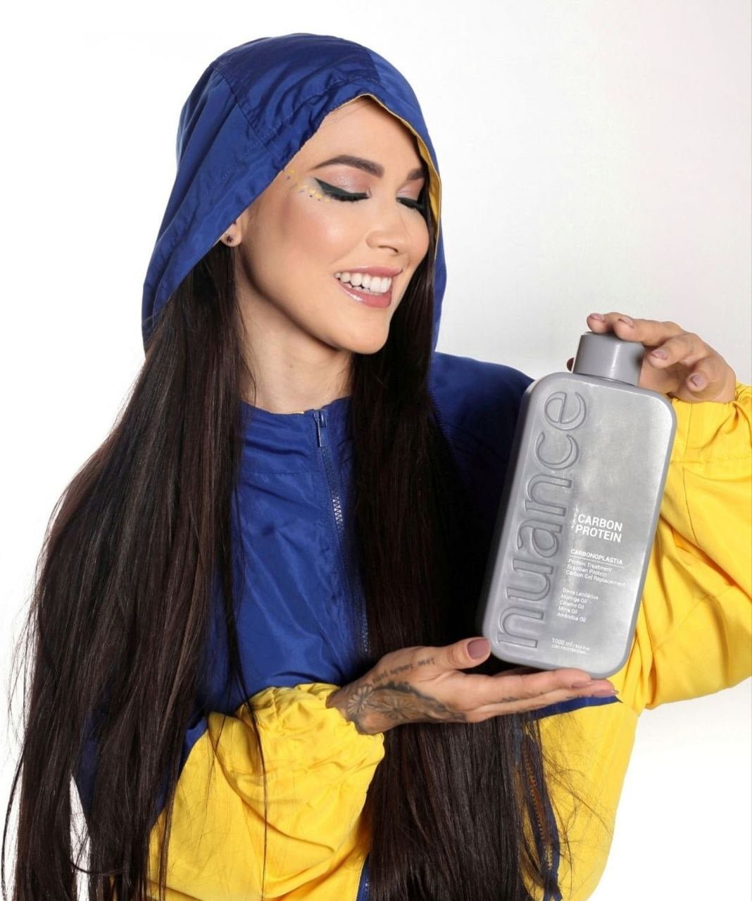 Nuance Professional Carbon Protein Brazilian Hair Treatment bottle, 100ml, with sleek packaging, designed for hair care and repair.